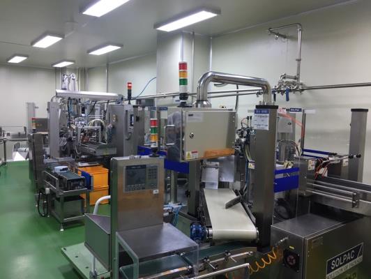 Photo of rotary three-sided pouch automatic filling machine